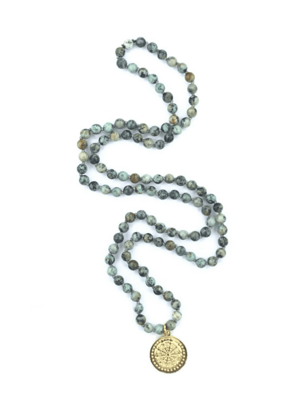 Beaded necklace with gold medallion