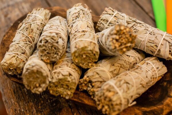 Tray with stacks of white sage sticks