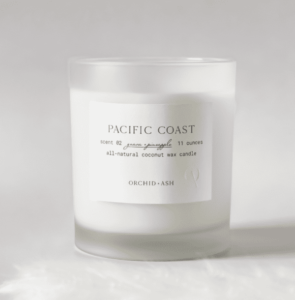 White, coconut wax blend candle with frosted glass.